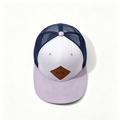Gorra Trucker de 6 paneles con banda para el sudor de algodón, cierre trasero de plástico y forma construida para mayor comodidad y durabilidad.